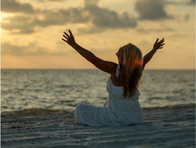 Breast cancer survivor Catherine Haffey on the beach